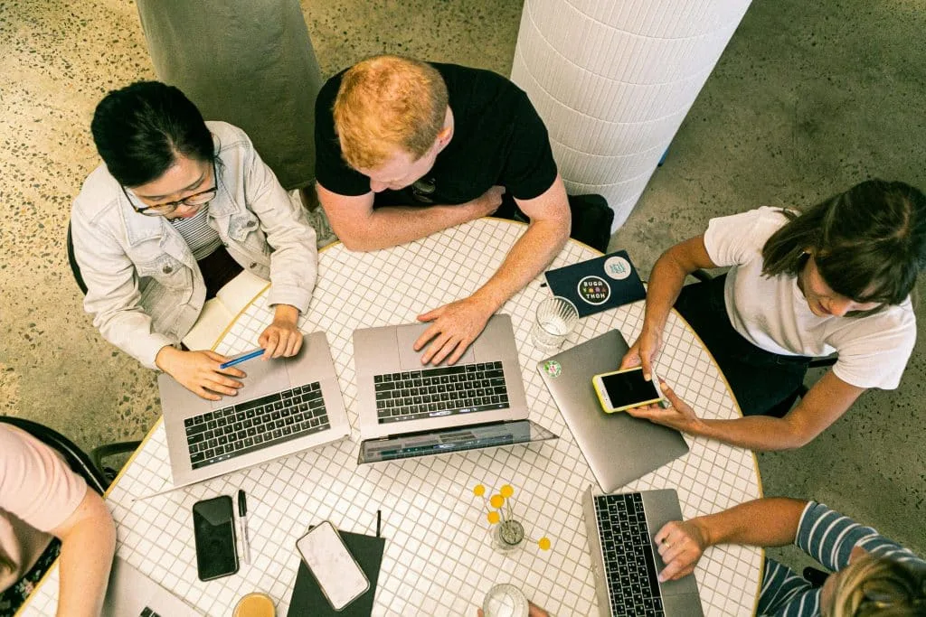 Creative marketing team working together around a table
