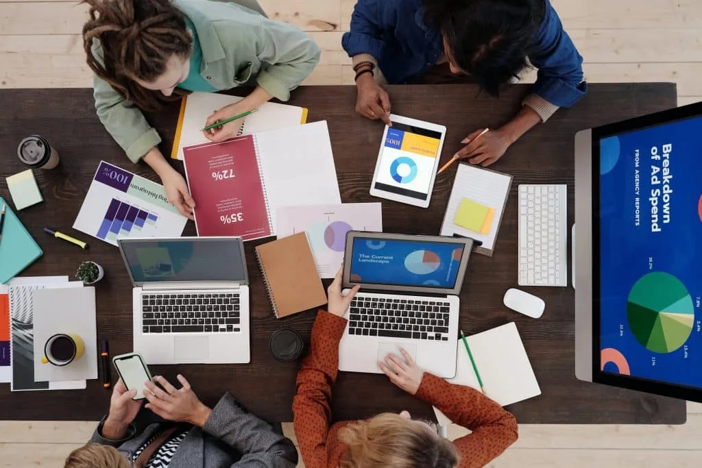 Legal professionals discussing a firm's growth opportunities